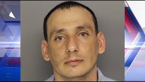 Warrant issued for Adams County bank robbery suspect