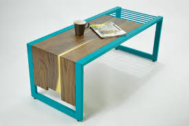 A round coffee table is modern, striking and works well in smaller living rooms. Invoke Coffee Table Bench Workof