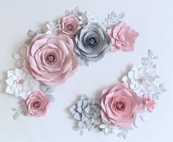 Kids can detect shiny items and a shiny star wall hanging is sure to catch your baby's attention. Paper Flower Set Nursery Paper Flower Wall Decor Baby Girl Etsy