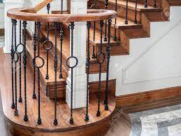 A wrought iron expert can help diagnose your railing's needs and come up with an appropriate repair plan. Classic Vintage Elegant Wooden Staircase With Wrought Iron Railing Stock Photo Picture And Royalty Free Image Image 109471172