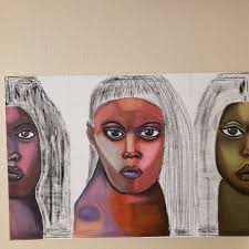 Adding more carved faces to the painting