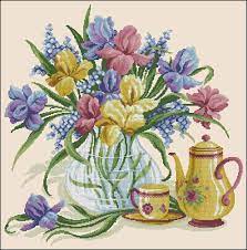 The x stitch of the cross stitch is one of the most easy stitches in embroidery and anyone can do this continuously as long as this is the easiest part in embroidering cross stitch flowers. Irises In A Vase Free Cross Stitch Pattern Free Cross Stitch Patterns