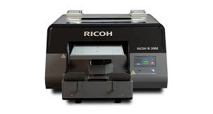 These versatile printers handle a wide range of tasks, from printing stunning photos to generating large reports and other documents in a timely manner. Ricoh Launches Ri 2000 Direct To Garment Printer Covering The Printing Inks Coatings And Allied Industries Ink World