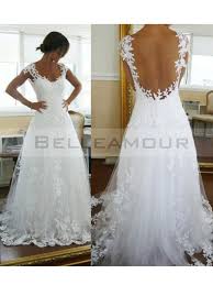 En 2020, les robes de mariée dos nu bohème ont la côté, tout comme les robes de mariée dos nu sirène. Mariage Elegant Robe De Mariee Dentelle Dos Nu
