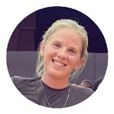 What fruit is growing by the pea fence water tote?