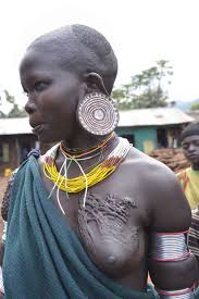 Scarification tattoo, scarification tattoos, body scarification, how to scarification, scarification healed, what is scarification, skin scarification, african scarification. File Scarification Suri Tribe 10029547156 Jpg Wikipedia