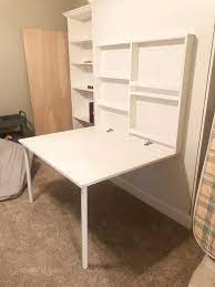 A perfect way to keep an extra bed tucked away and ready for guests. How To Build A Diy Murphy Bed With Desk And Bookcases Part 2 Lamberts Lately