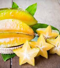 The Star Fruit Is That Green Garnish The Sweet Potato Vendor Often Displays On His Stand Referred To As Kamrakh In Hindi A Fruit Weird Fruit Fruit Benefits