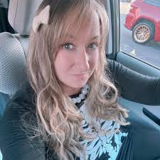 Speaking through tears, interim Superintendent Catty Moore announces during  tonight's WS/FCS school board meeting that 300-350 positions could be  eliminated district-wide to help solve budget issues.