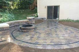 Extending an existing concrete patio with concrete or brick pavers involves the same basic process as building a new patio. Planning Your Outdoor Living Space Stone Paver Patio Vs Stamped Concrete Patio Trunorth Landscaping