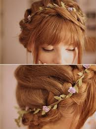 The flower braid is yet another way to try out the braid trend. Cute Flower Braided Updo With Rosebud Band Hairstyles Weekly