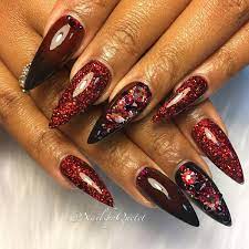 The vibrant combination of red and gold will make you gaze at the designs. 26 Hot Red And Black Nail Designs Ideas