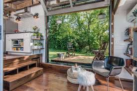 Country living regular nancy fishelson, pictured here, has a longstanding affinity for whites and neutrals. Inside A Tiny House With A Pop Out Deck Alpha Tiny Home By New Frontier Tiny Homes