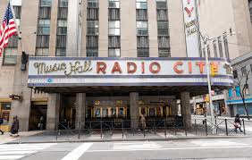 Radio city music hall is an entertainment venue at 1260 avenue of the americas, within rockefeller center, in midtown manhattan, new york city. Radio City Music Hall To Reopen Next Month To Vaccinated Audiences