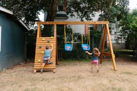 The swing set in the back yard is an indelible childhood memory for many of us. How To Build A Diy Wooden Swing Set Dunn Diy