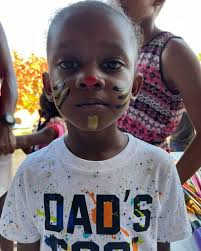 Julia Young Spreads Joy Through Face Painting at Charlie Burton Park Kidz  Xmas Party 2023 in Belize City** Julia Young, the passionate ambassador for  the Jude Belize Foundation, brought boundless smiles and