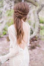 And it can work with or without a veil. Bridal Ponytails Arabia Weddings
