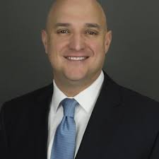 BRAD HACKER, BENCHMARK MORTGAGE