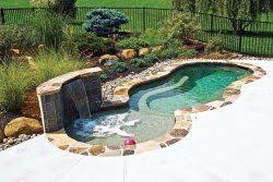 Small Swimming Pool With Waterfall And Sun Shelf Add Endless Swimming And This Would Be Perfect Diy Swimming Pool Small Swimming Pools Small Pools