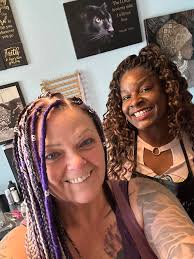 Massage therapist seeking hair braiding services trade