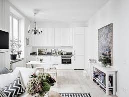 Apartment Black And White Theme House This Beautiful Compact Studio Apartment Treats With Lots Of Natural Light And Interesting Details In Textil One Wall Kitchen Kitchen Layout Living Room Kitchen