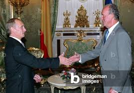 RUSSIAN PRESIDENT PUTIN SHAKE HANDS