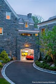 It May Be A Gloomy Day But It S Pretty Bright In That Shiny Garage With Those Two Beauties Ferrari Garage House Garage Design Luxury Garage