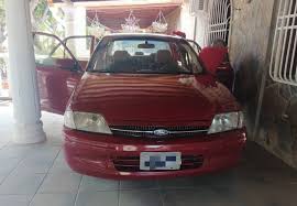 Vendo mi Ford láser año 2001 pintura, motor, cauchos nuevos en perfectas  condiciones. Económico por motivos de viaje ubicado en Barquisimeto, para  más información llamar al 04145644060