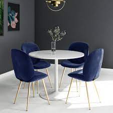 Chrome metal eiffel style legs. Jenna White Round Table 4 Chairs In Blue Velvet With Gold Legs Furniture123