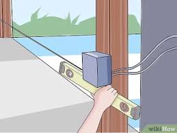 The safety reversing sensors must be connected and aligned correctly before the garage door opener will move in the down direction. How To Align Garage Door Sensors 9 Steps With Pictures