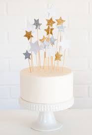 Celebrate Under The Stars With These 20 Celestial Holiday Decorations Diy Cake Topper Simple Cake Topper Star Cakes