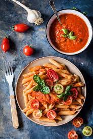 Vegan Pasta In Fresh Tomato Sauce The Green Loot Vegan Pasta Vegan Pasta Recipes Fresh Tomato Sauce Easy Pasta Dishes