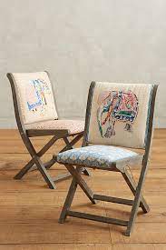 This folding chair is nothing like that. 18 Folding Chairs That Don T Ruin Your Dining Table Vibe Architectural Digest
