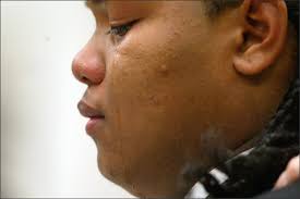 Mother of slain boy accuses family, Highline SD of failing to secure gun