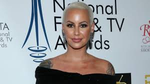 Entertainer, model & activist amber rose stopped by the studio with celebrity makeup artist bryan mendez to talk her everyday glam routine, beauty secrets, a. Amber Rose Totally Transforms With New Long Hair Look Shows Off Face Tattoos Entertainment Tonight
