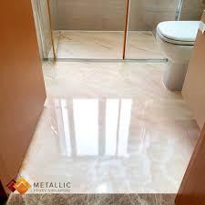 A Classy Orange Gold Mixed Marble Design With Gold Veins Creating A Warm And Cosy Ambience For This Ensuite Metallic Epoxy Epoxy Floor Flooring Floor Design