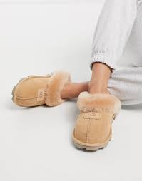 Zappos is having a flash sale on the versatile ugg coquette slippers, but only for a limited time! Ugg Coquette Slip On Slippers In Bronzer Beige Modesens