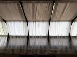 Motorized blinds on the other hand, can be installed on the ceiling either interiorly or exteriorly, and controlled using a remote control or switch. Curved Solarium Window Covers For Cheap Er Using Tension Rods Victorian Conservatory Interior Solarium Ideas Solarium