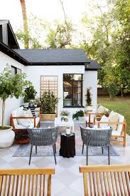 Outdoor patio furniture includes full or half height tables that are useful to eat, or display plants. Getting Your Patio Ready For Spring Juniper Home