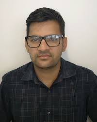 Dr. Devender Kumar