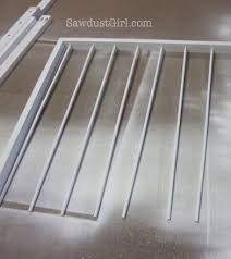 Also, you'll need to find the wooden dowels (maybe in the closet section used for hanging clothes), and get three if applicable, wait for glue to dry. How To Make A Pull Out Sweater Drying Rack Sawdust Girl