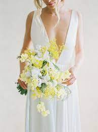 Try a bouquet with yellow roses accented with blue hydrangeas. Romantic Spring Wedding Bouquet Ideas Wedding Sparrow Fine Art Wedding Blog Yellow Wedding Bouquet Yellow Wedding Flowers Spring Wedding Bouquets