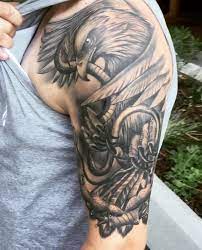 Eagle Vs Snake Eagle Tattoo Forearm Eagle Tattoo Tattoos