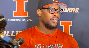 Illinois defensive coordinator Aaron Henry joyful over being a new father