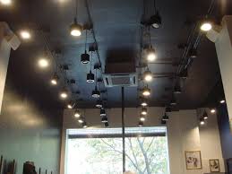 Dramatic Showroom Lighting Google Search Lighting Showroom Lighting Ceiling Lights