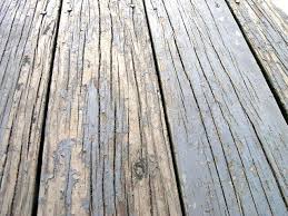 How To Stain And Repair A Peeling Pressure Treated Wood Deck We Ve Lived Here For 5 Years Now And Have Always Treated Wood Deck Wood Deck Painted Wood Deck