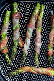 Season with fine sea salt and freshly cracked black pepper, to taste. Air Fryer Bacon Wrapped Asparagus Tasty Air Fryer Recipes