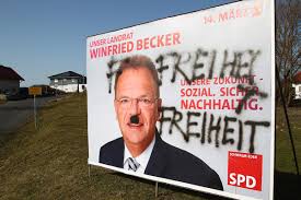 Olaf scholz has overseen the emergency €750bn (£675bn; Wahlplakate Beschmiert Nh24 De