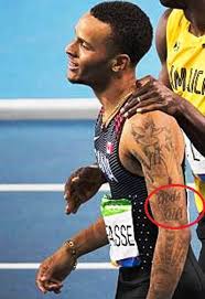 God's gift tattoo my first tat. Andre De Grasse S 5 Tattoos Their Meanings Body Art Guru
