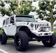 White Rubicon Has A Lift Customized Including Front End Led Lights Jeep Wrangler Jeep Badass Jeep